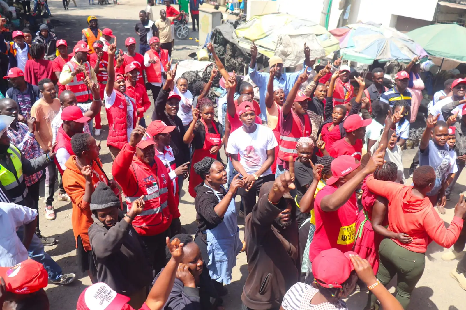 Cheering street crowd in red
